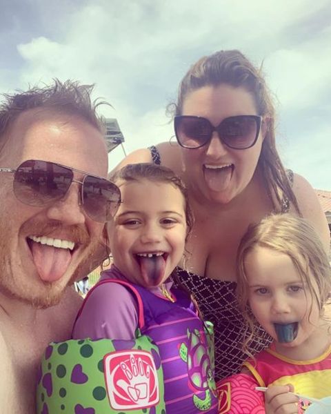 Kaycee Stroh with her spouse Ben Higginson and their daughters