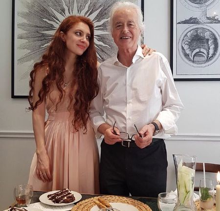 Scarlett Sabet is in a relationship with Jimmy Page.