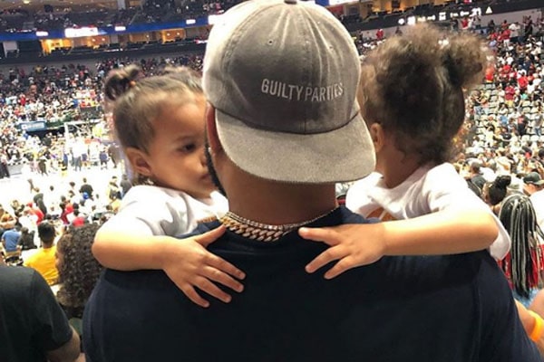 Andre Emmett with daughters