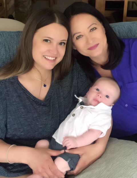 Two women and a baby.