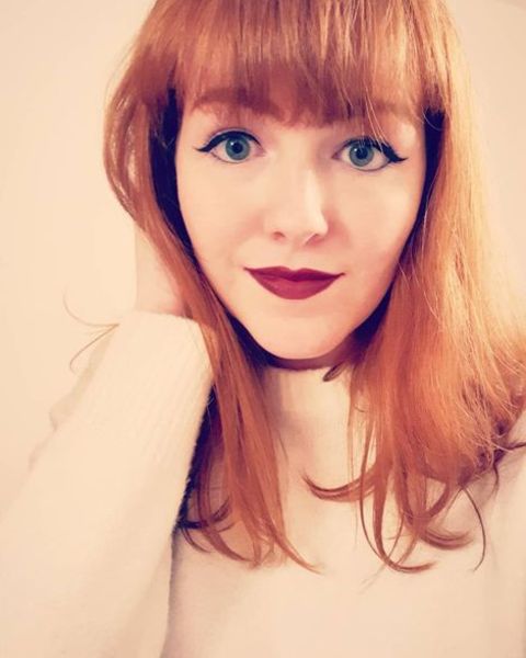 Singer, Josie Charlwood's selfie where she is shocashing her red hair and beautiful green eyes.