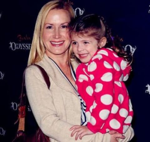 Isabel Ruby Lieberstein in a pink dress with her mother Angela Kinsey.
