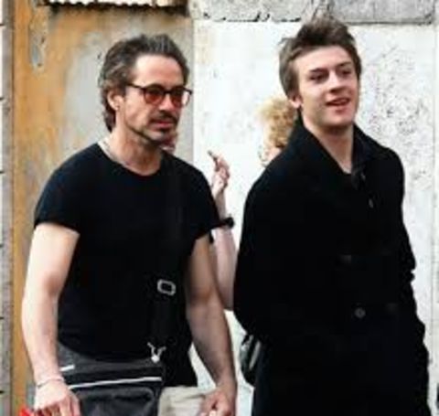 Indio Falconer Downey Jr. in a black t-shirt with dad Robert Downey Jr.