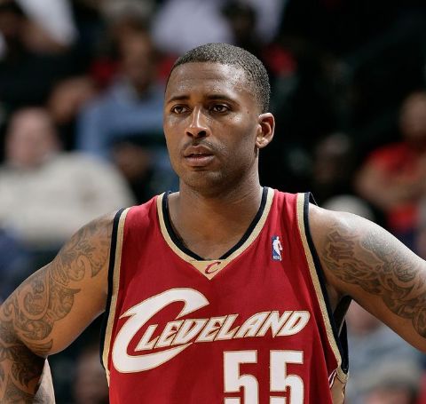 Lorenzen Wright in a red jersey of Cleveland Cavaliers caught on action.