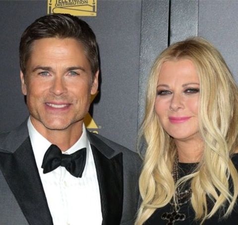Sheryl Berkoff in black dress with her life partner Rob Lowe.