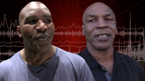 Evander Holyfield with Mike Tyson.