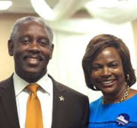Val Demings with her husband Jerry Demings pose for a picture.