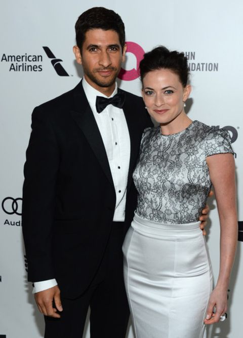 Raza Jaffrey giving a pose along with his wife, Lara Pulver in an event.