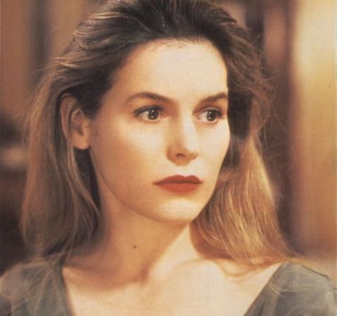 Alice Krige in a brown outfit caught on camera while acting.
