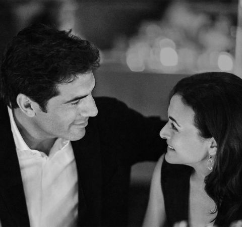 Tom Bernthal in a black  suit alongside fiancee Sheryl Sandberg.