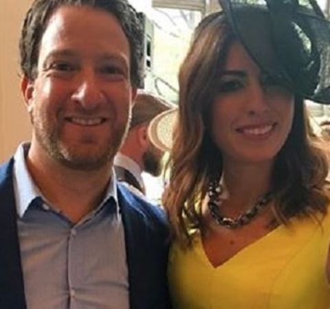 Renee Portnoy in a yellow dress with ex-husband Dave Portnoy.