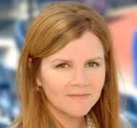 Mare Winningham poses for a picture in a brown hair