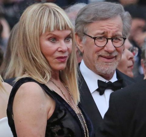 Kate Capshaw in a black dress poses with lover Steven Spielberg.