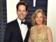Julie Yaeger in a brown wife poses with husband Paul Rudd. Source: Good housekeeping
