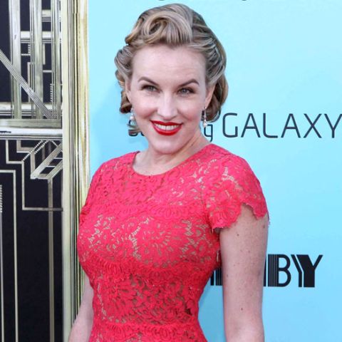 Actress, Kate Mulvany giving a pose in an event.