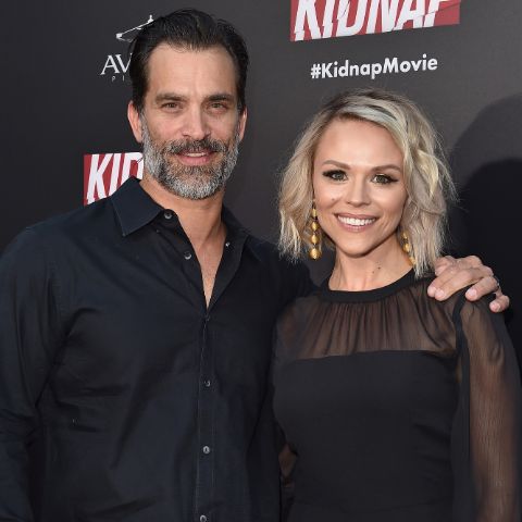 Johnathon Schaech giving a pose along with his wife, Julie Solomon.