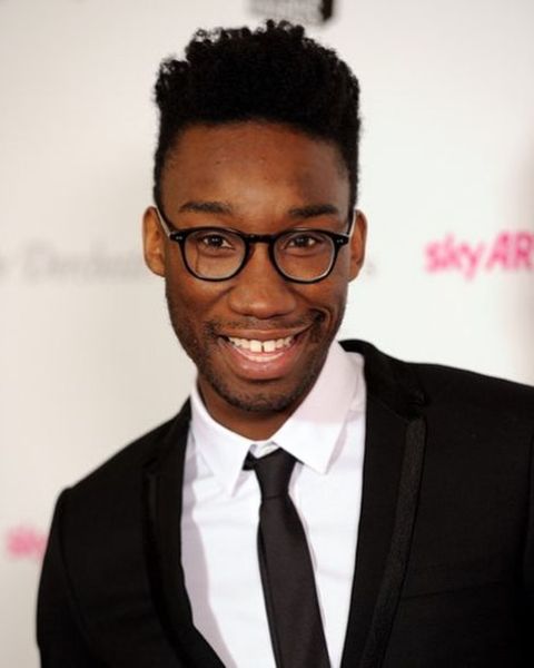 Nathan Stewart Jarrett giving a pose in an event.