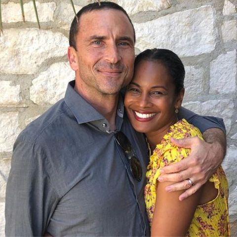 Robinne Lee giving a pose along with her husband, Eric Hayes.