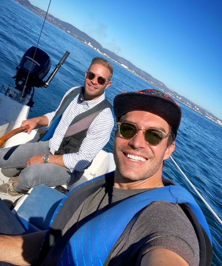 Jacob Jules Villere with his husband Peter Porte on their Yacht